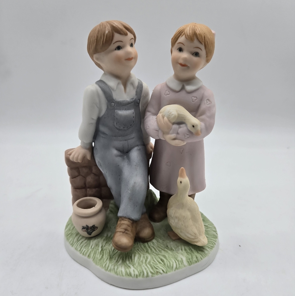 The Potter's House Kids.  Showing Kindness Figurine